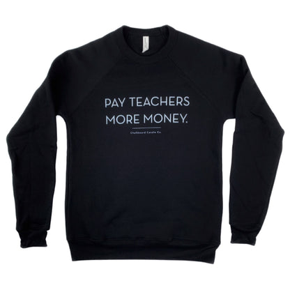 Crew neck black sweatshirt with 'Pay Teachers More Money' on the front in white text on a white background.